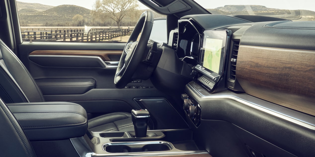 Side view of the front interiors of the 2026 Chevrolet Silverado LD Crew Cab.