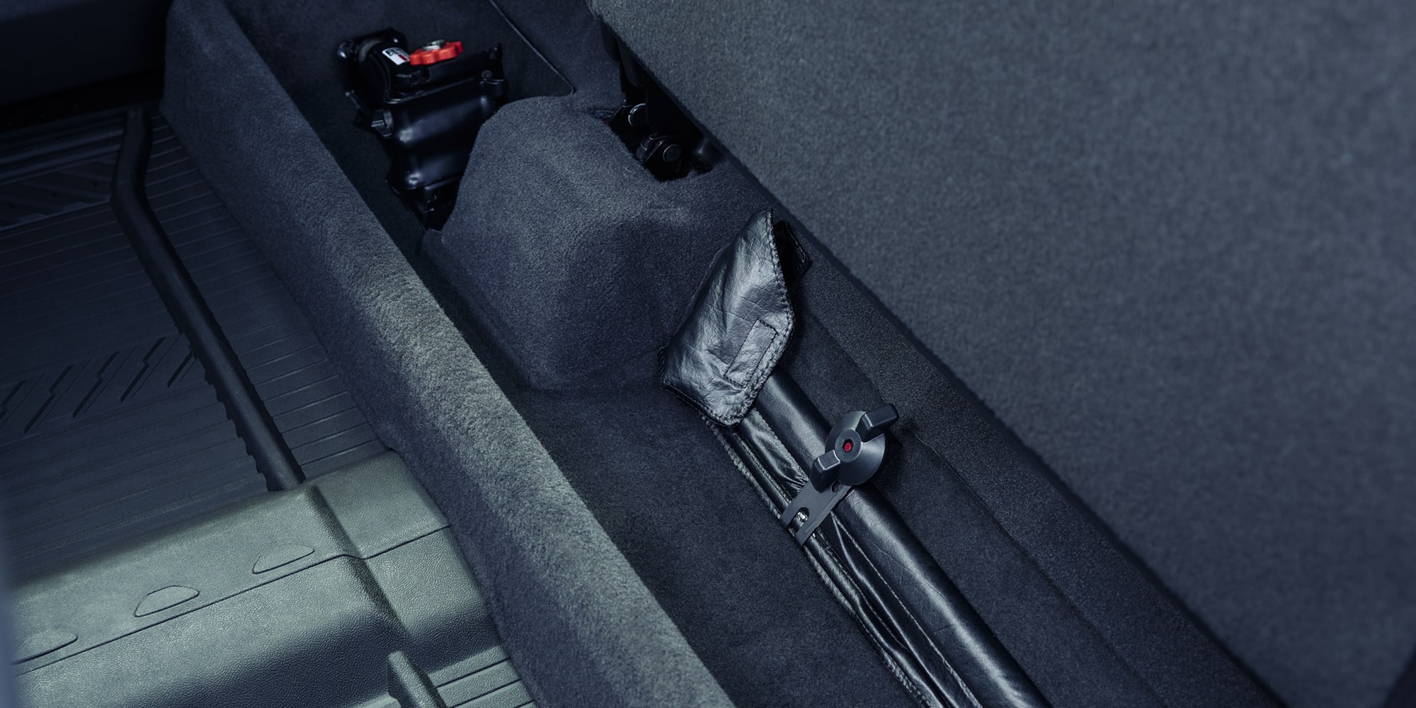Close up view of the Under Seat Storage of the 2026 Chevrolet Silverado LD Crew Cab.