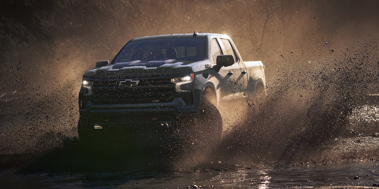 Chevrolet Silverado pickup driving on a road