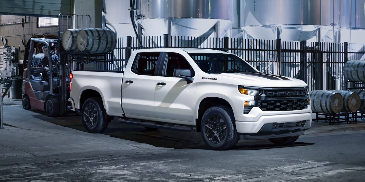 Side view of the 2026 Chevrolet Silverado LD parked indoors.
