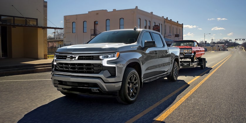 Chevrolet Silverado 1500 towing a heavy trailer