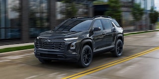 Low Angle Three Quarters View of a 2026 Blue Chevy Colorado on a Desert