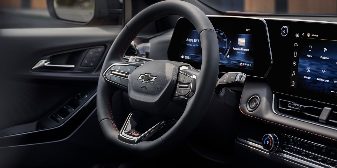 Driver's Seat View of the 2027 Chevy Equinox Steering Wheel and Dashboard