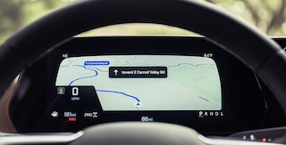 Close-up of the Display Dashboard with the Driver Selecting a Program in a 2026 Chevy Colorado
