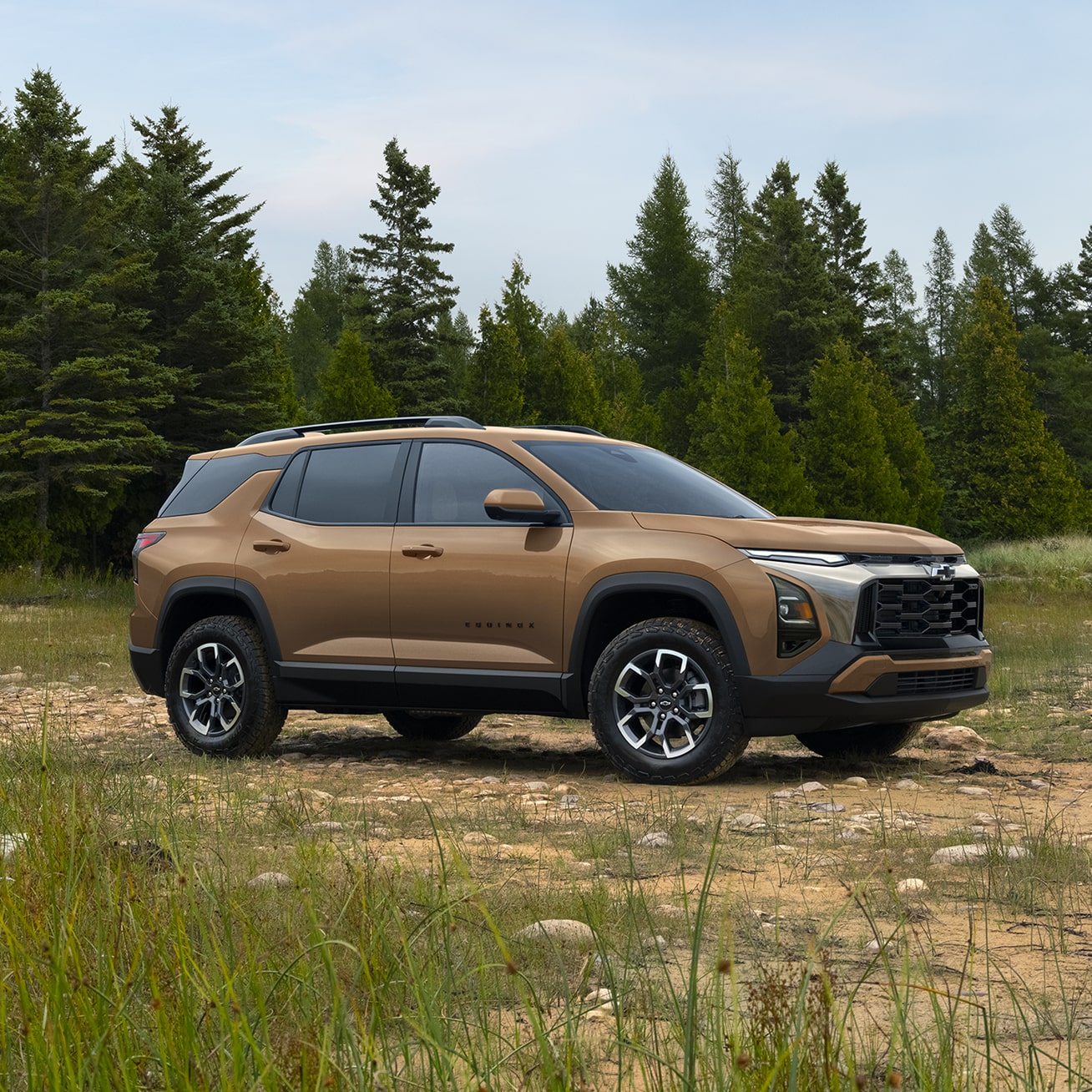 Profile View of a 2027 Chevy Equinox Parked in the Middle of an Open Area in the Woods