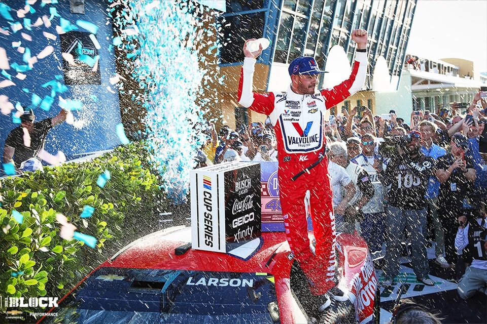 Larson celebrates with his Hendrick Motorsports team in Victory Lane.