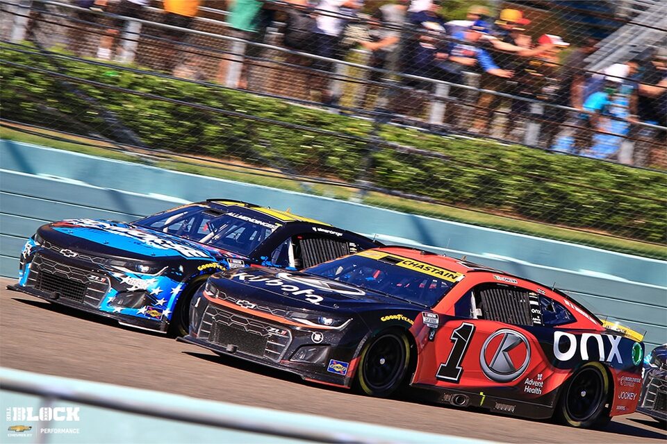 Team Chevy drivers Ross Chastain (1) and AJ Allmendinger battle for position.