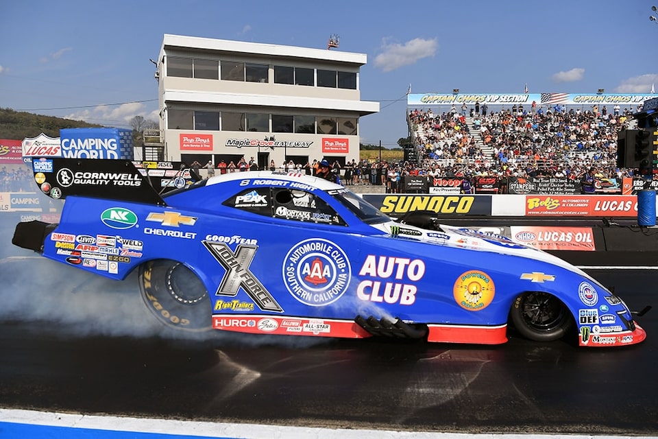 Robert Hight extended his Funny Car points lead after winning at Reading his Camaro SS.