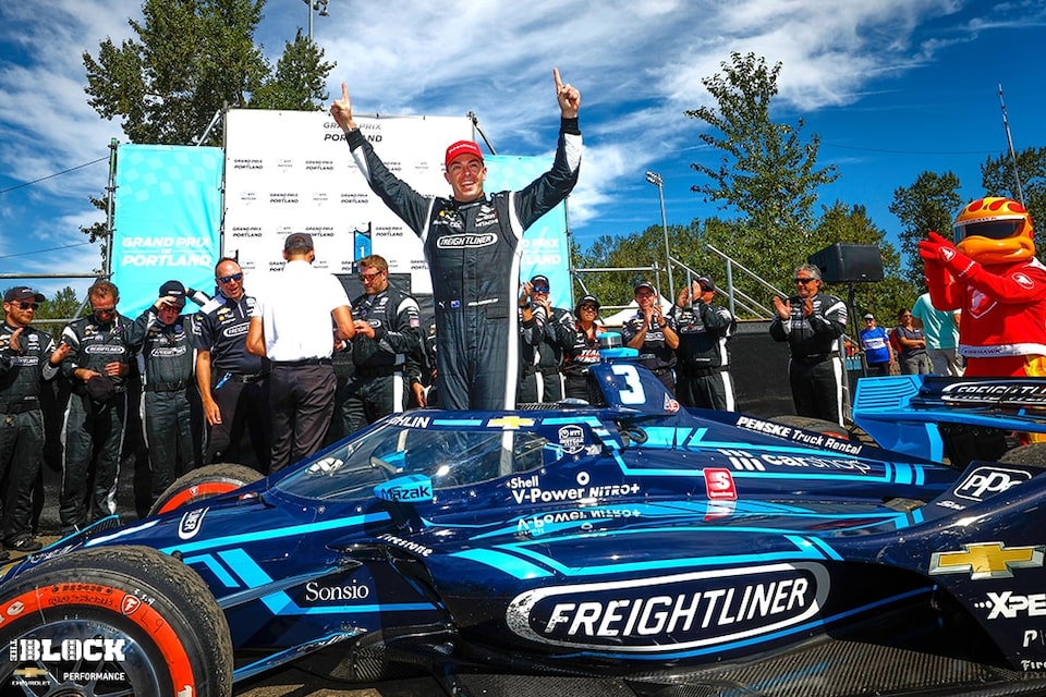 McLaughlin celebrates with his Team Chevy and Team Penske teammates.
