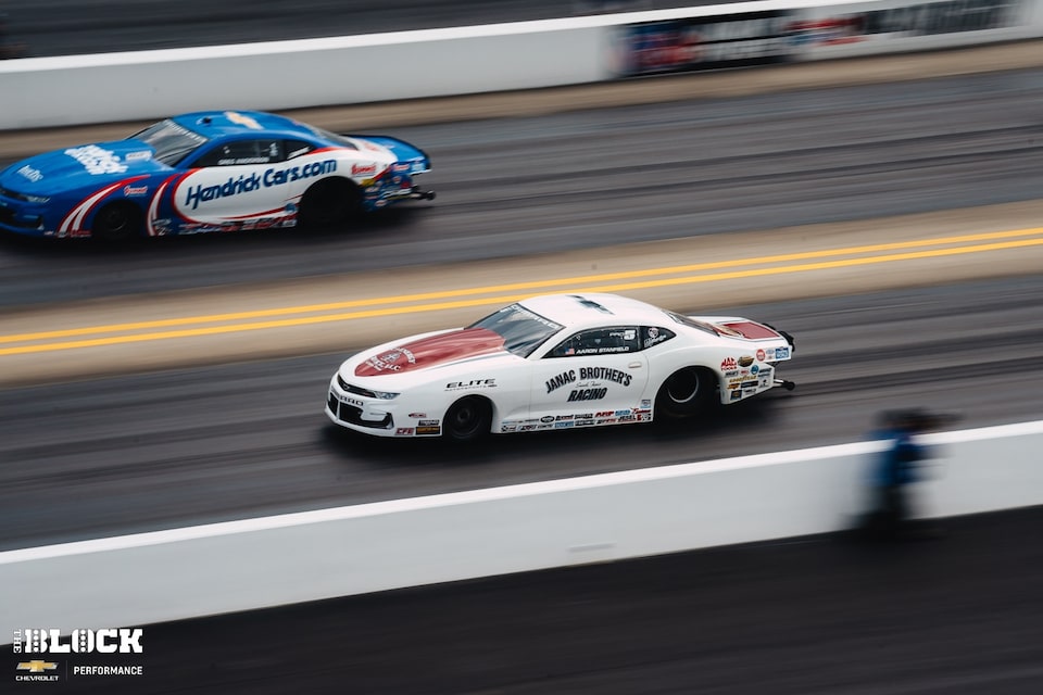 Aaron Stanfield (near lane) piloted his Elite Motorsports Camaro SS to his third Pro Stock win of the year at zMAX Dragway.