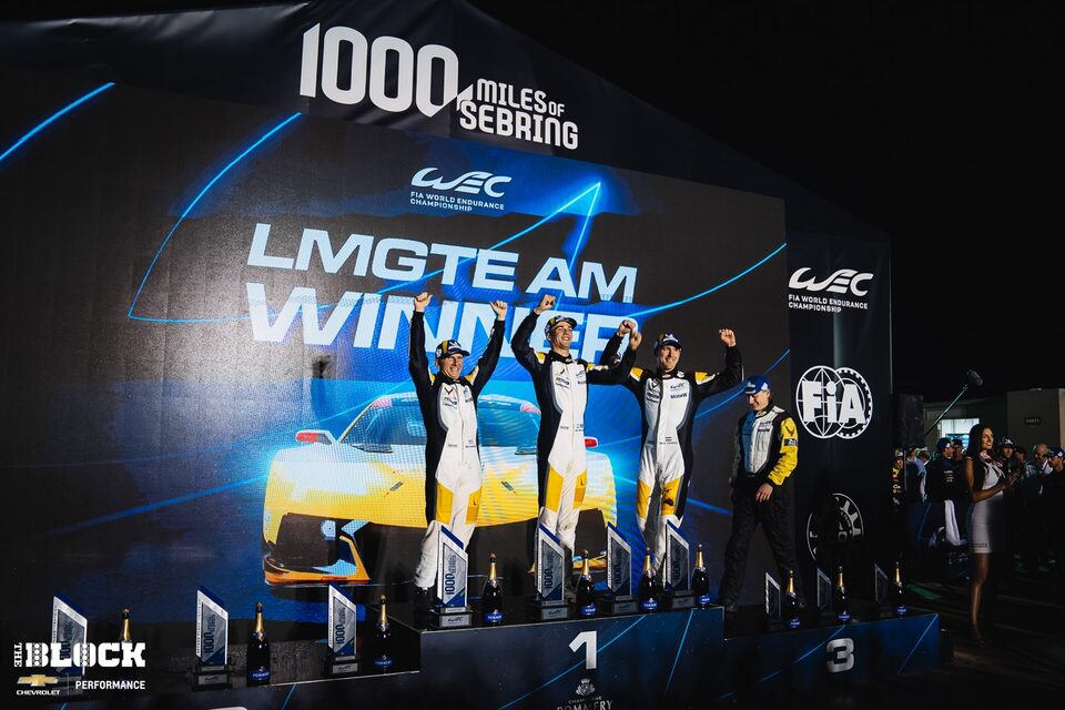 Keating (left) celebrates on the Sebring podium with teammates Nico Varrone (center) and Nicky Catsburg (right).