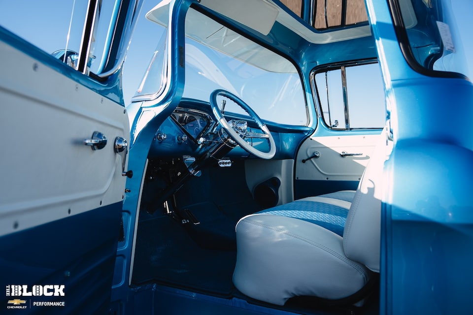 The truck's interior could be straight out of 1955.