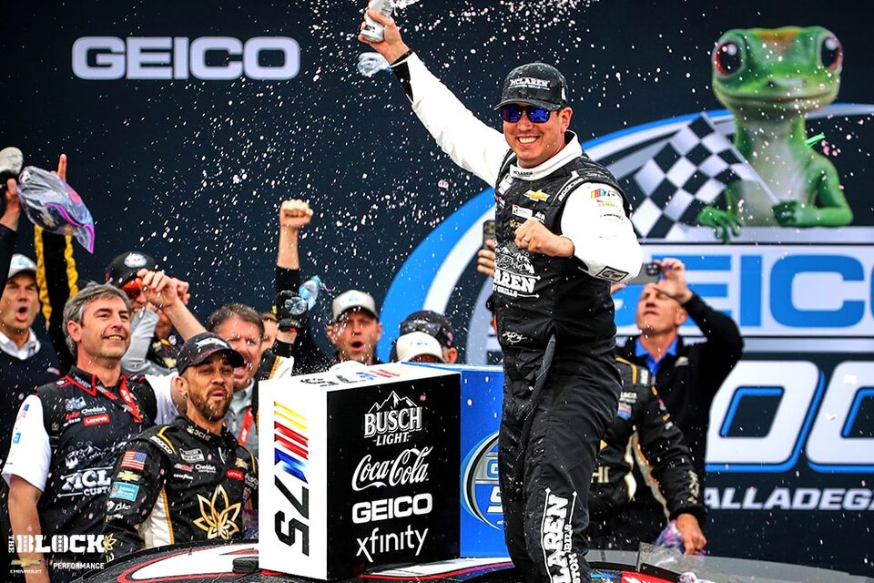  Busch celebrates with his Richard Childress Racing teammates in Talladage Superspeedway Victory Lane.