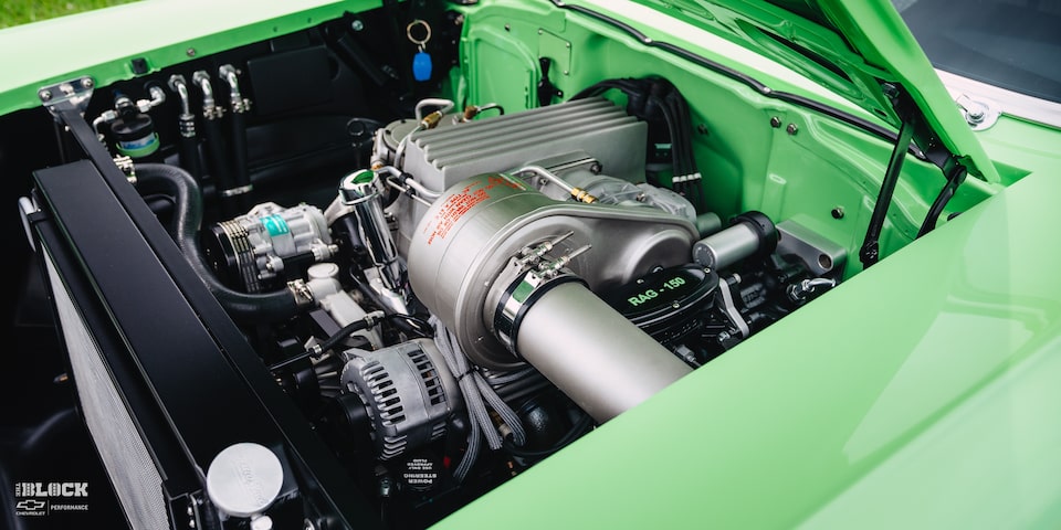 The Chevrolet Performance LS376/480 crate engine* under the hood of Laird’s ’57 Chevy. The power plant features a Lokar intake manifold.