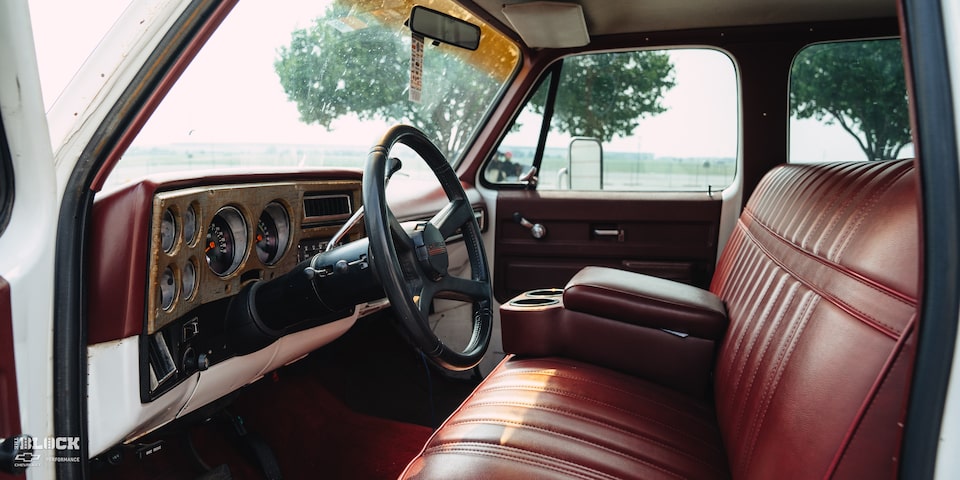 The interior features new seats and a modern stereo system.