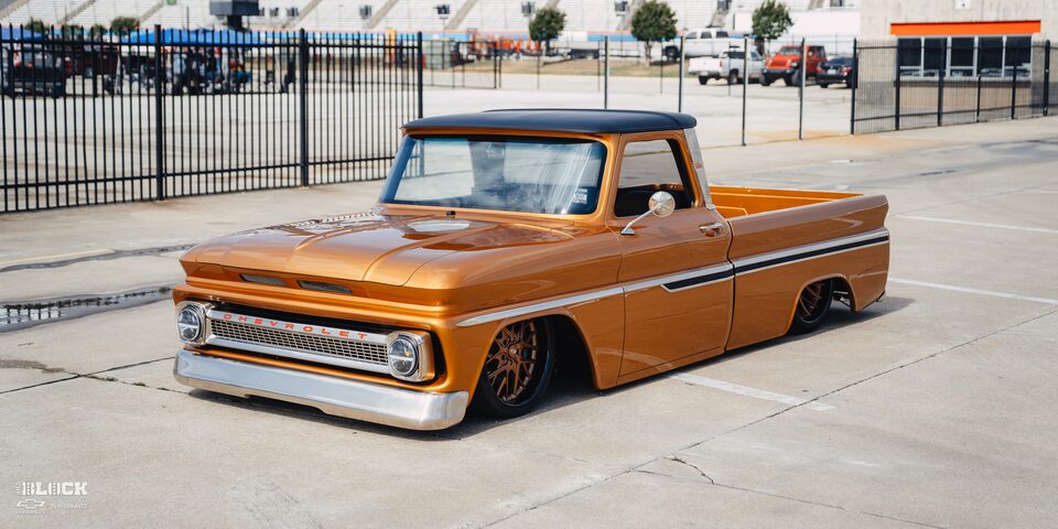 1966 Chevy C10 Custom Truck 3/4 View Parked In Front Of Fence