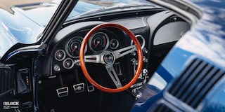 Close-up of the Steering Wheel From Driver's Perspective in a LT1-powered 1964 Chevy Corvette