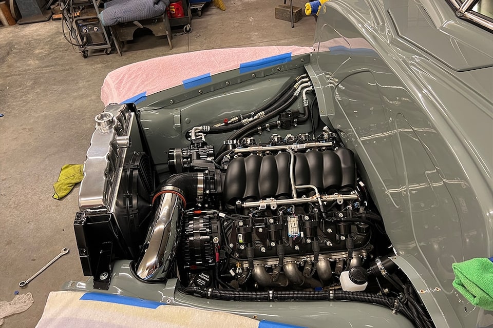 The Chevrolet Performance LS376/480 crate engine* in Goldsmith's truck during the installation process at Young at Heart Customs.