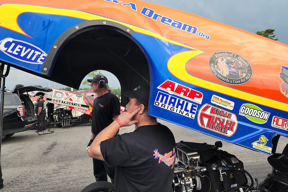 Jay Blake and his team in the staging lanes at a race.