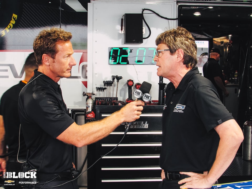 Crew chief David Grubnic (right) is interviewed by Brunno Massel of NHRA on FOX.