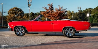 Side View of a 1966 Chevrolet Chevelle SS Convertible Parked in an Empty Parking Lot