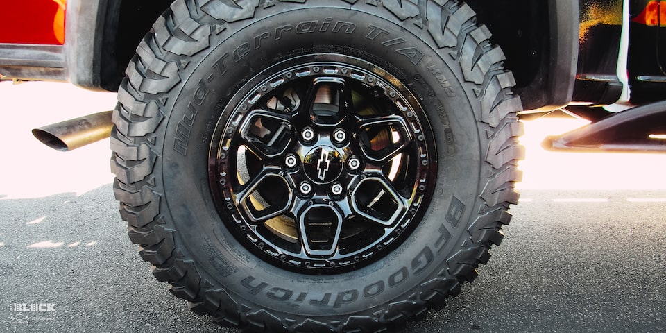 Closeup of Wheel on a Modified Off-Roading Chevrolet Silverado Truck