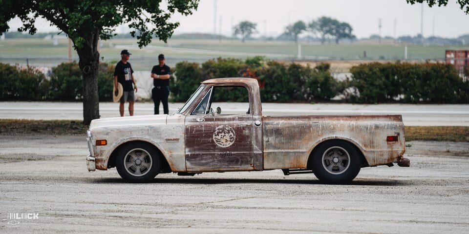 Side View of Dwight Ward’s 1971 GMC C15 Truck Parked In An Empty Lot