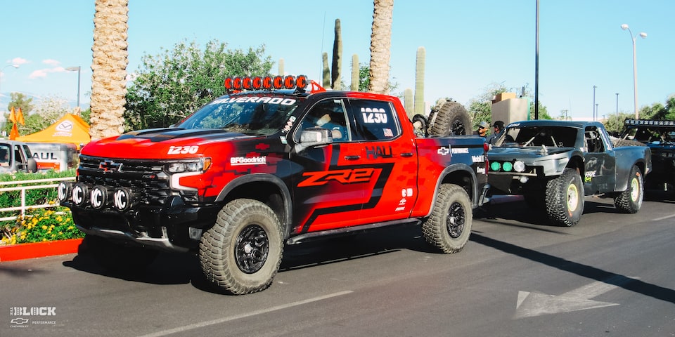Front Side View of a Off-Roading Chevy ZR2 Truck With the Driver Inside