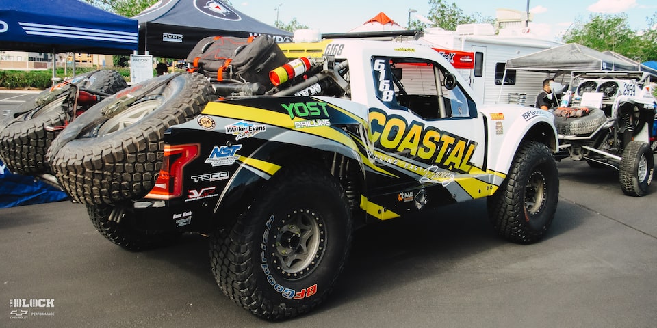 Rear Side View of an Off-Road Chevy Truck Parked