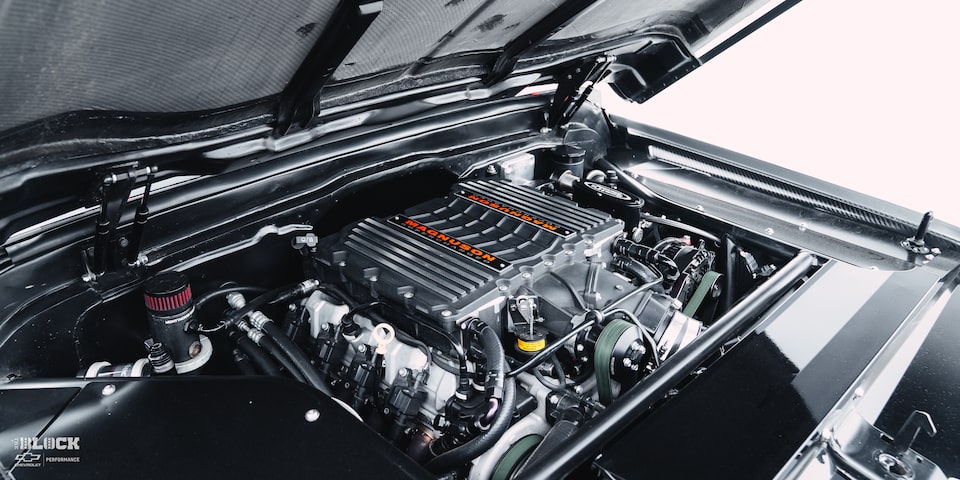 Front Three-Quarters View Close-up of the Engine Bay in a 1970 Chevy K5 Blazer