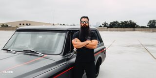 Scott's Hotrods 'n Customs Owner Standing Next to His 1970 Chevy K5 Blazer
