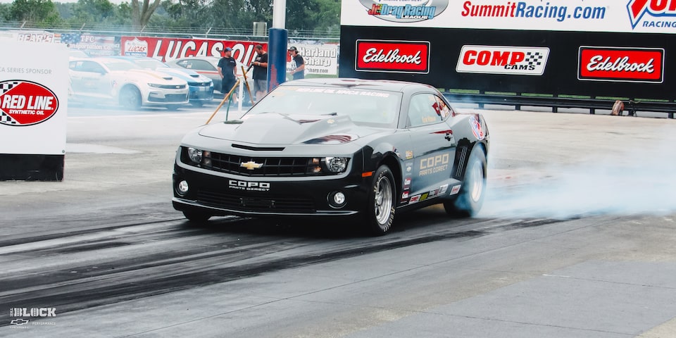 Front Side View of Chevy Copo Camaro on a Race Track