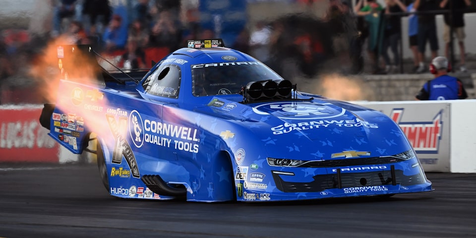 Chevy Driver Robert in His Race Car on the Race Track with Flames Coming Out of the Exhaust
