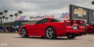 Rear Three Quarters View of Mitch Dixon's 1996 Greenwood Corvette Parked at a Race Track