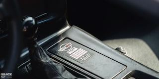 The Gear Shift for a 1996 Greenwood Corvette With a Label Reading "CORVETTE LT4"