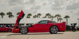 Side View of Mitch Dixon's Red 1996 Greenwood Corvette with the Hood Open