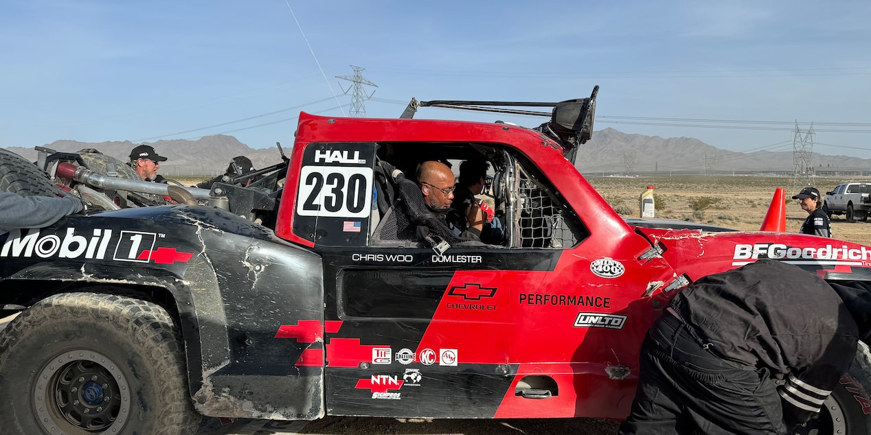 GM Engineer Dom Lester in the Passenger Seat of Hall Racing's Red Chevrolet Truck at the BFGoodrich Tires Mint 400