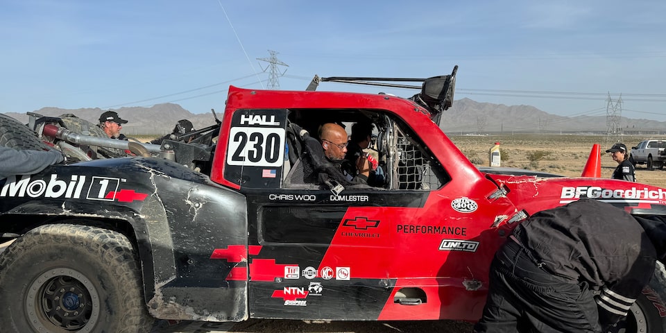 GM Engineer Dom Lester in the Passenger Seat of Hall Racing's Red Chevrolet Truck at the BFGoodrich Tires Mint 400