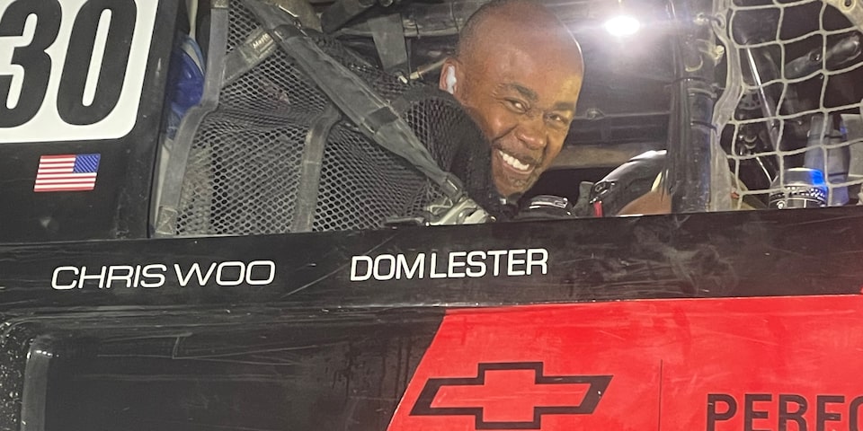 GM Engineer Dom Lester Smiles as He Looks Out the Passenger Window of Hall Racing's Unlimited Truck