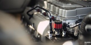 Close-up of the Oil Catch Can with a Filter Next to the Engine of 1958 Chevy Apache Pickup Truck