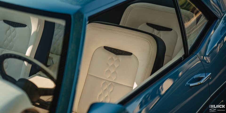 View of the Driver's Seat of a 1968 Camaro Seen Through the Driver's Side Window