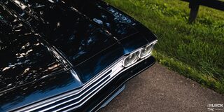 Overhead View of the Hood of a 1969 Black Chevy Chevelle Vehicle