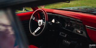 Viewing the Front Interior of 1969 Chevy Chevelle through the Left Window