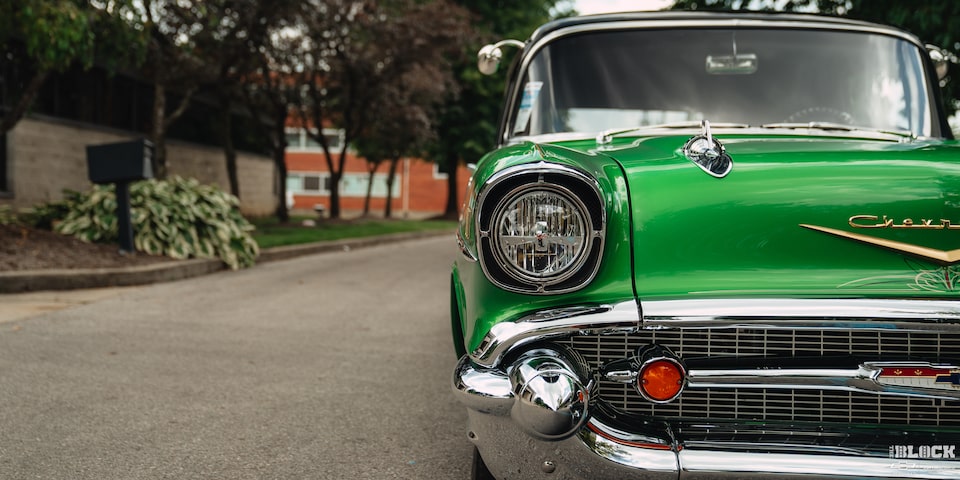 Close-up Rightside View of a Synergy Green 1957 Chevrolet Sedan Delivery