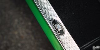 Close-up of a "Body by Fisher" Ornament on a Synergy Green 1957 Chevrolet Sedan Delivery