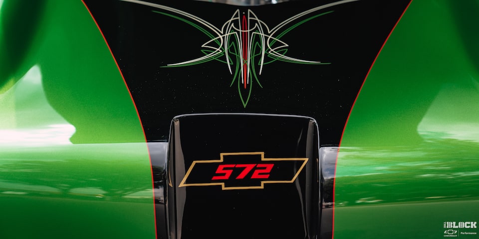Custom pinstriping and graphics are found throughout the car.
