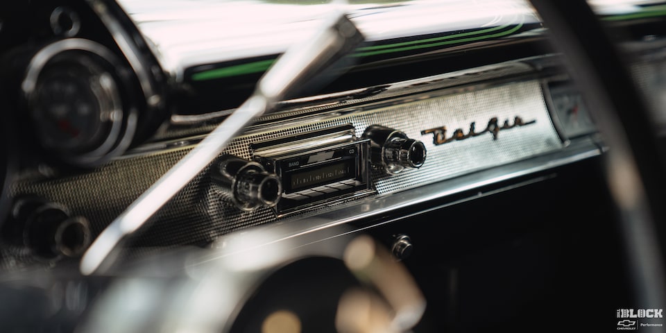 View of the Dashboard Radio Through the Steering Wheel in a 1957 Chevrolet Sedan Delivery