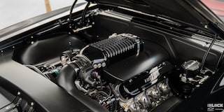 Close-up View of the Shining Black Engine of a 1968 Chevy Camaro
