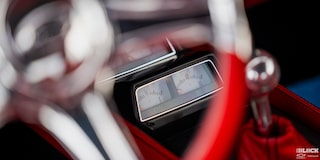 Close-up of the Fuel and Oil Gauges Seen through the Steering Wheel of a 1968 Chevy Camaro