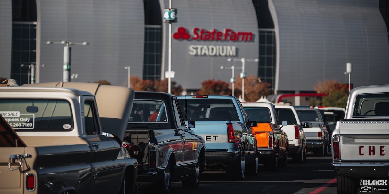 Three Quarters View of a Line of Cars on the Road Next to the State Farm Stadium